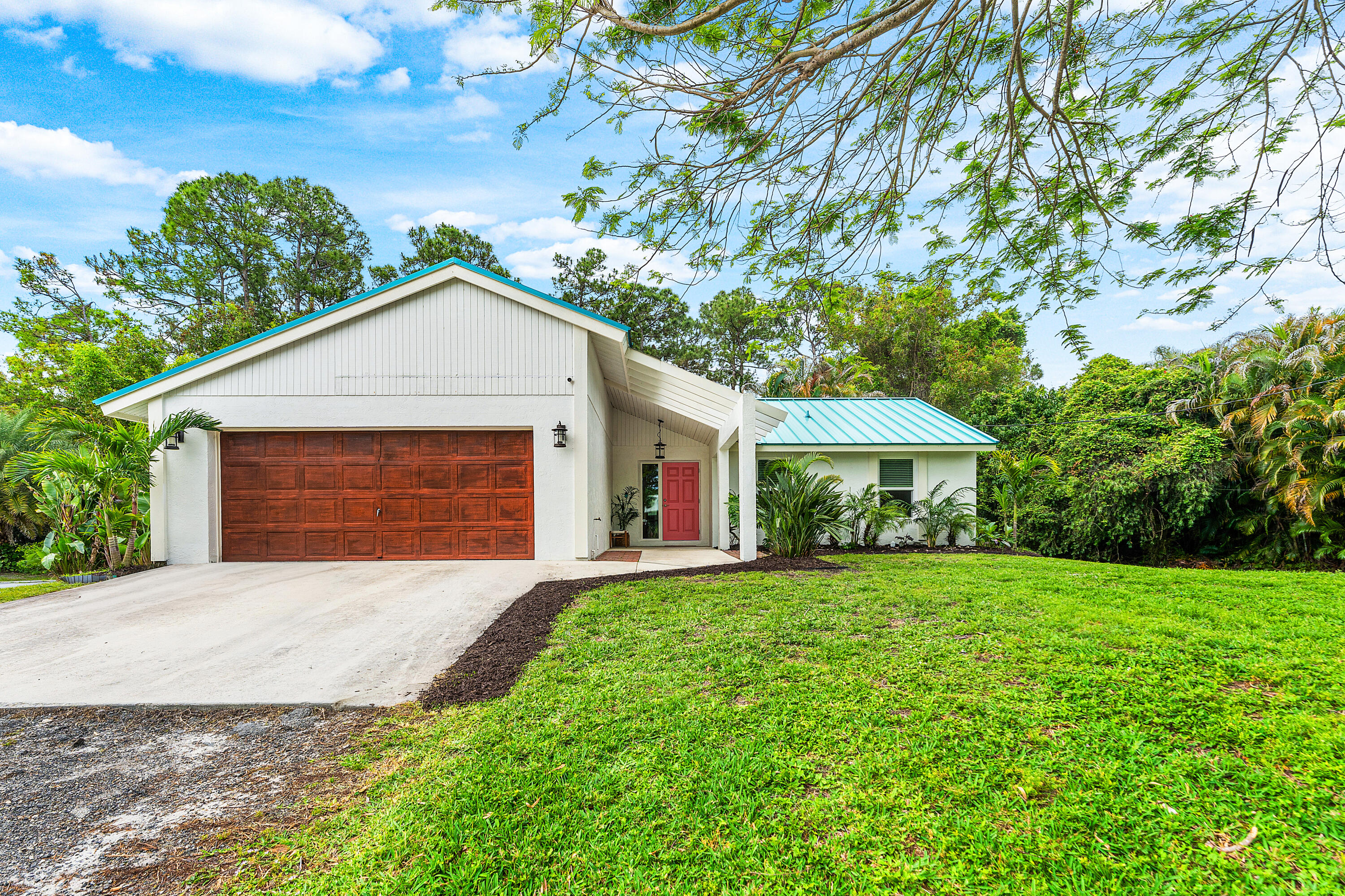 14752 86th Road North The Acreage, FL 33470 - Photo 1 of 29 001-1475286thRoadNorth-TheAcreage-FL-334