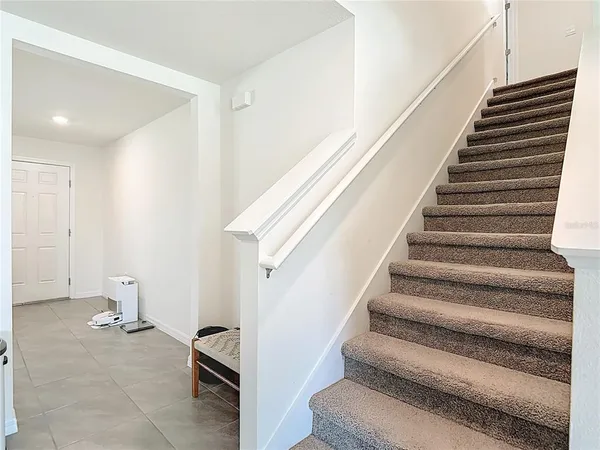 a view of a hallway with closet