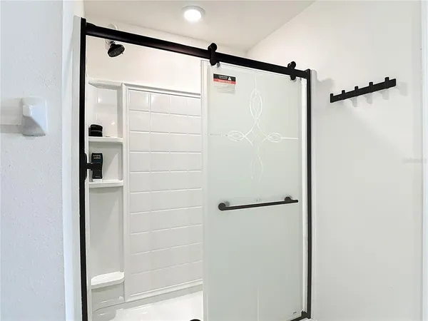 a aerial view of a house with a yard