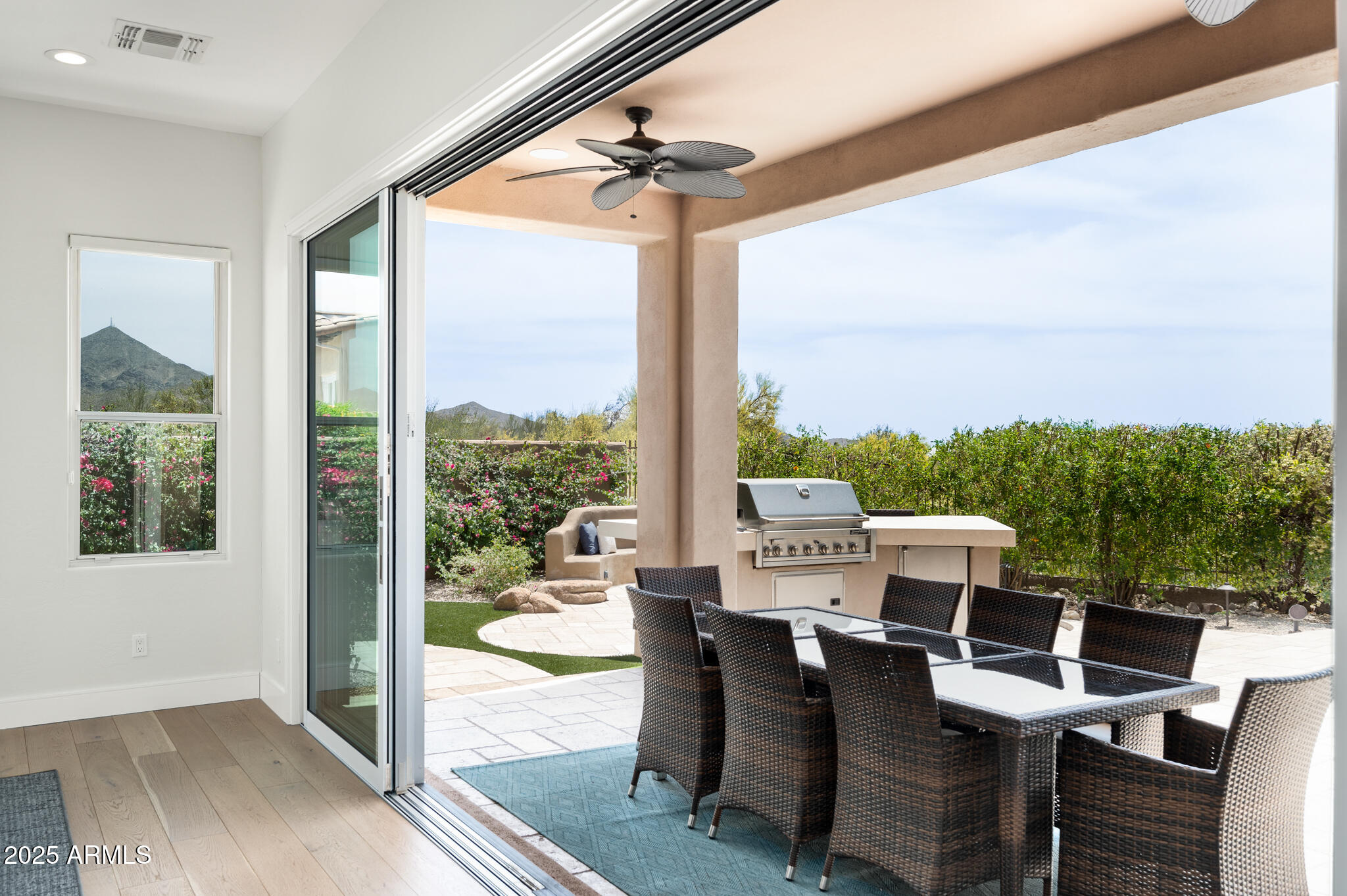 9631 East Mountain Spring Road Scottsdale, AZ 85255 - Photo 11 of 48 a view of a patio with table and chairs
