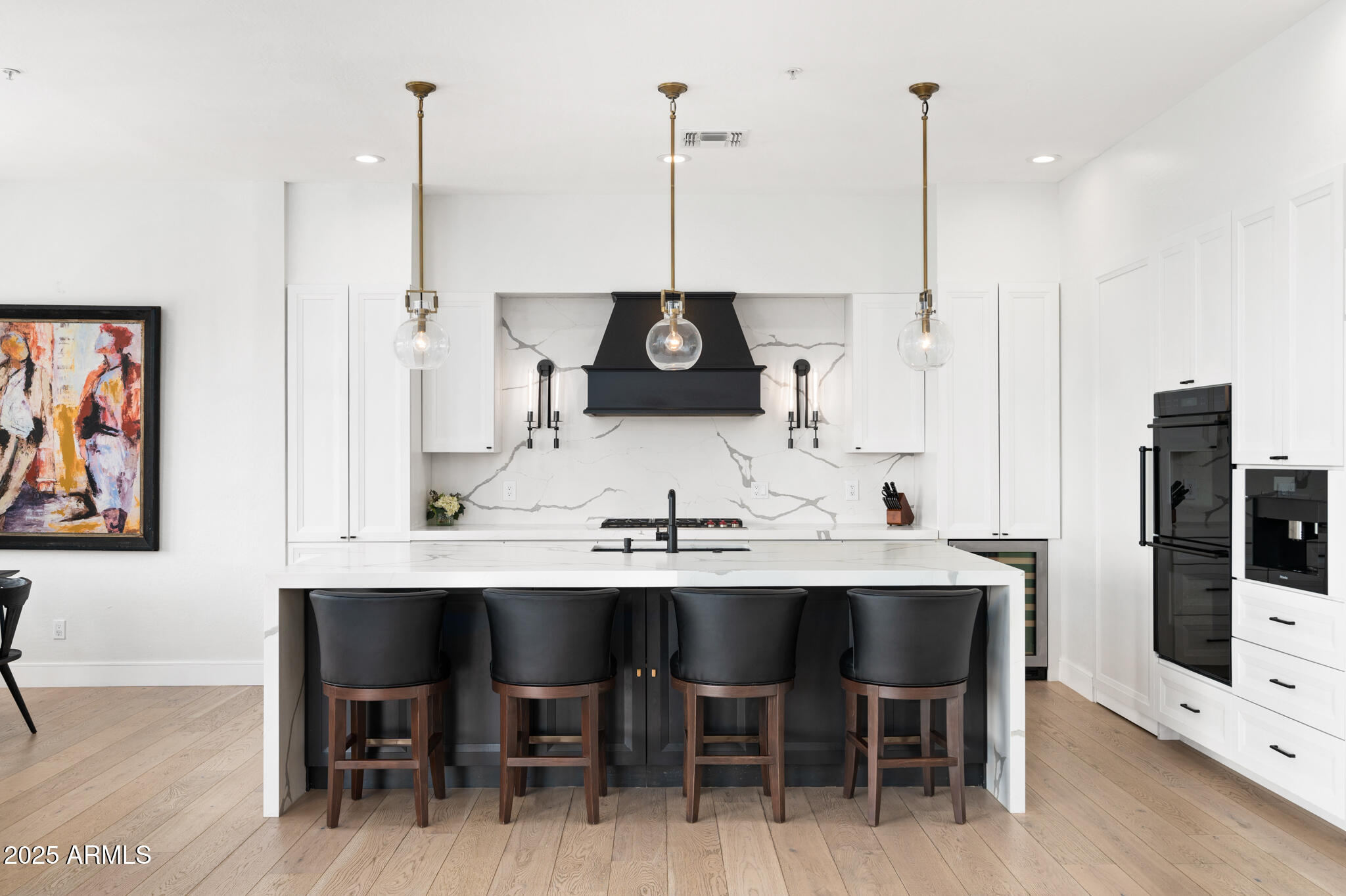 9631 East Mountain Spring Road Scottsdale, AZ 85255 - Photo 14 of 48 a view of a dining room furniture and wooden floor