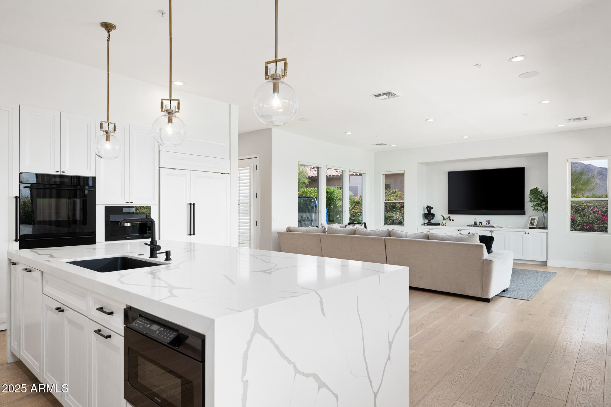 9631 East Mountain Spring Road Scottsdale, AZ 85255 - Photo 16 of 48 a view of living room with furniture and flat screen tv