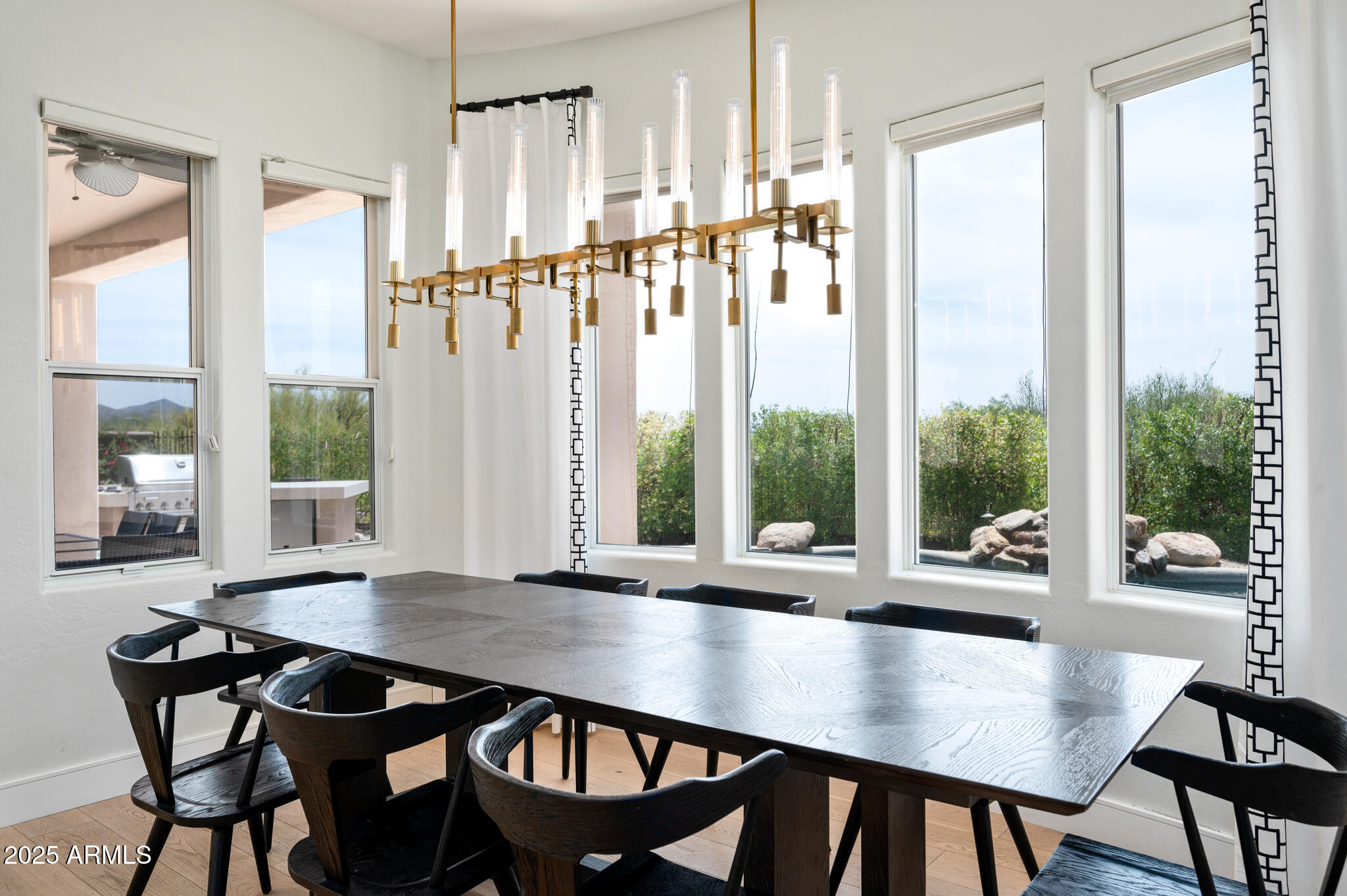 9631 East Mountain Spring Road Scottsdale, AZ 85255 - Photo 19 of 48 a view of a dining room with furniture window and outside view