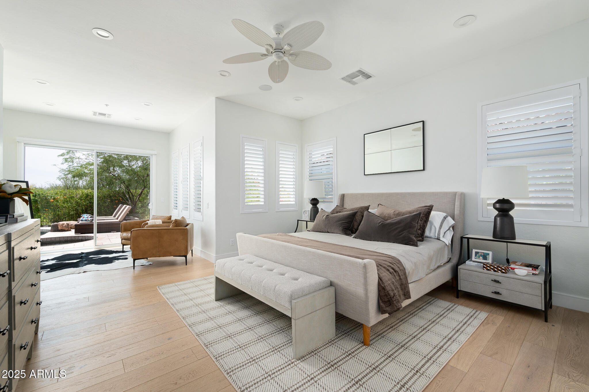 9631 East Mountain Spring Road Scottsdale, AZ 85255 - Photo 21 of 48 a bedroom with a bed and a large window