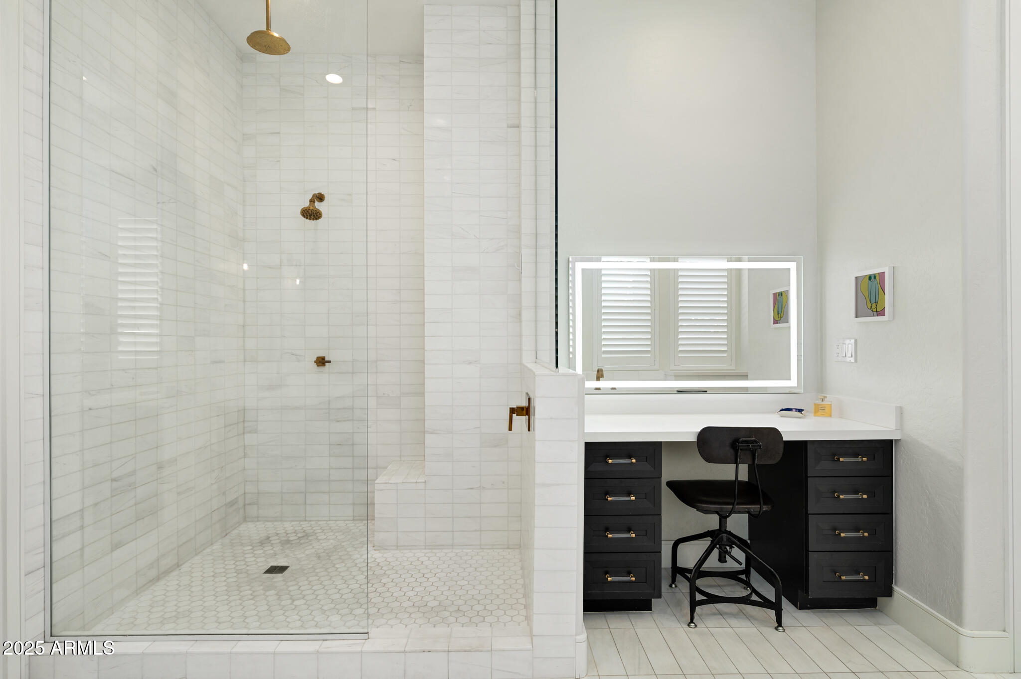 9631 East Mountain Spring Road Scottsdale, AZ 85255 - Photo 26 of 48 a bathroom with a sink and a mirror