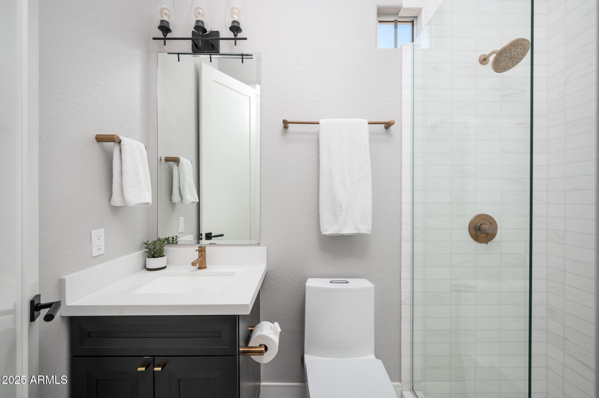 9631 East Mountain Spring Road Scottsdale, AZ 85255 - Photo 28 of 48 a bathroom with a sink toilet and shower