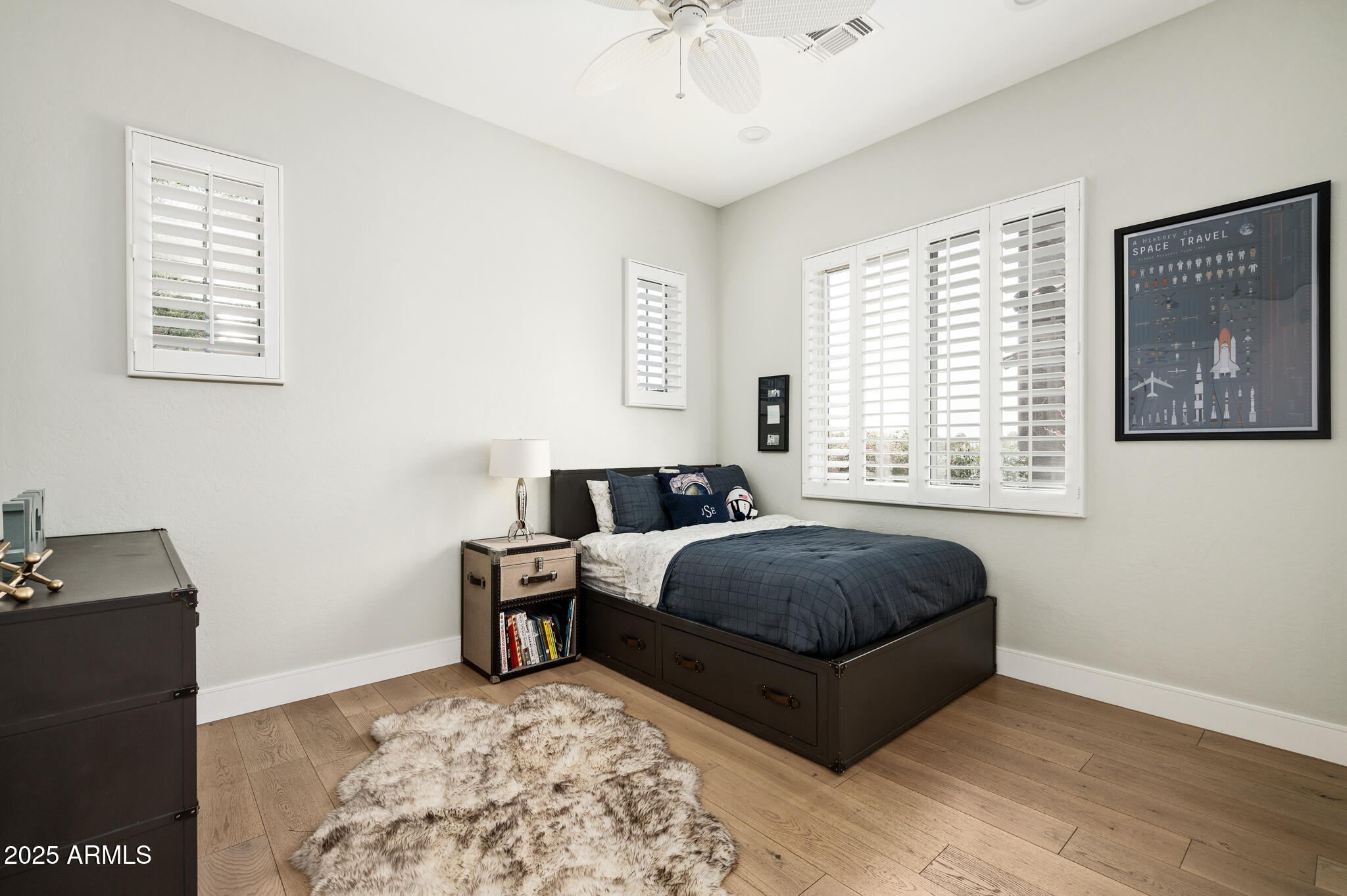 9631 East Mountain Spring Road Scottsdale, AZ 85255 - Photo 30 of 48 a living room with a bed furniture and next to a window
