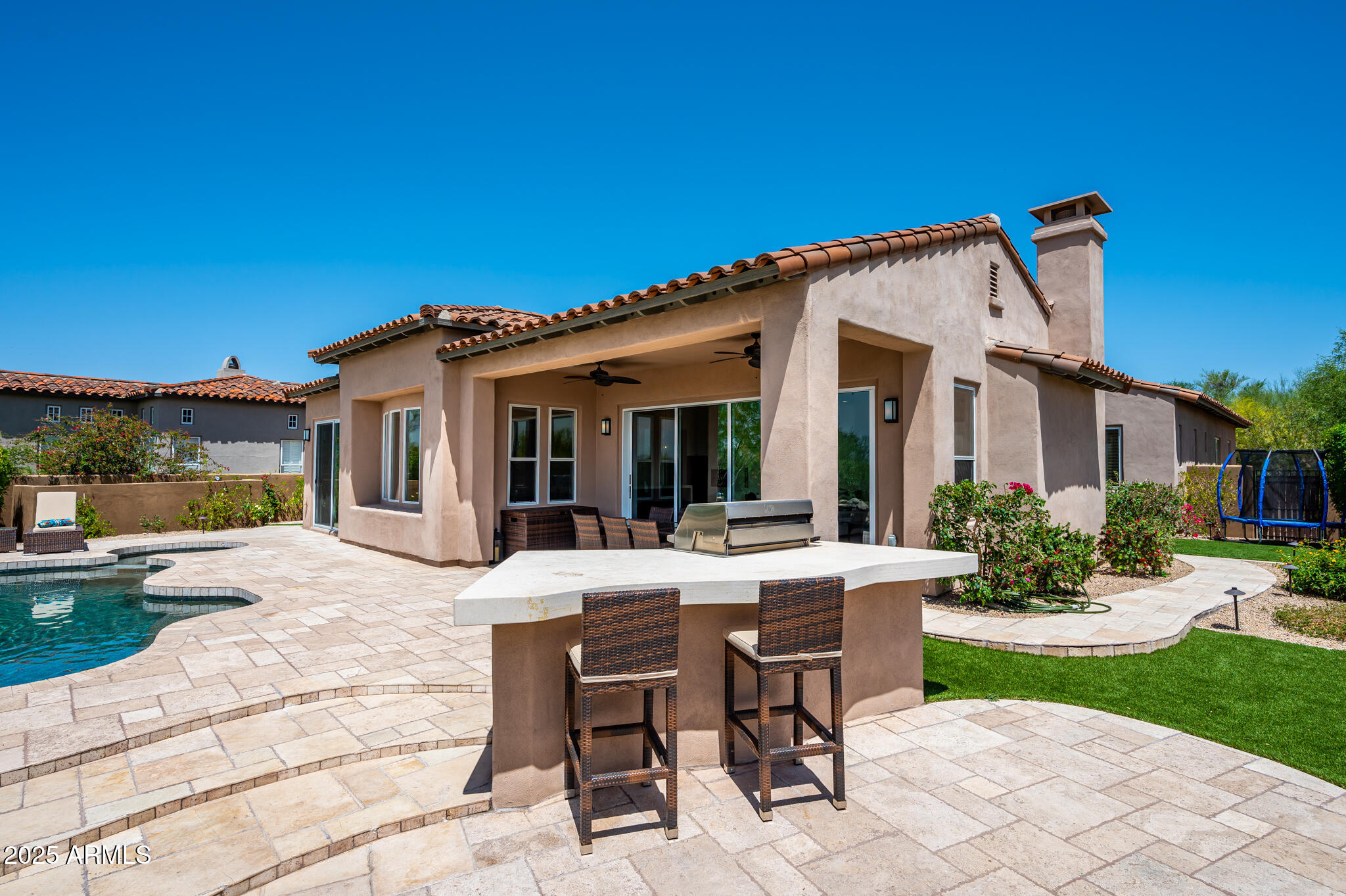 9631 East Mountain Spring Road Scottsdale, AZ 85255 - Photo 41 of 48 a view of a house with backyard and sitting area
