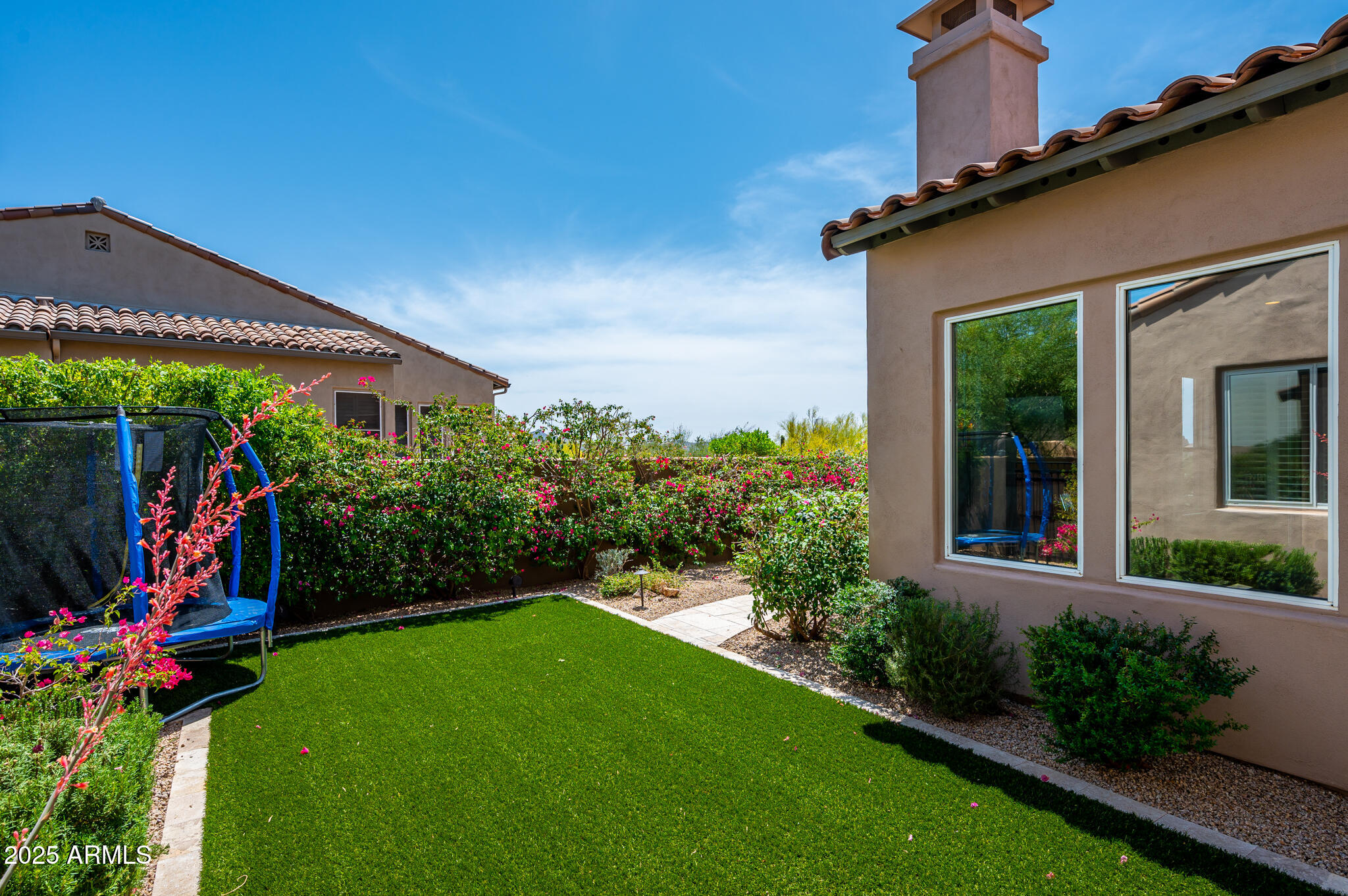 9631 East Mountain Spring Road Scottsdale, AZ 85255 - Photo 43 of 48 a view of a house with a backyard
