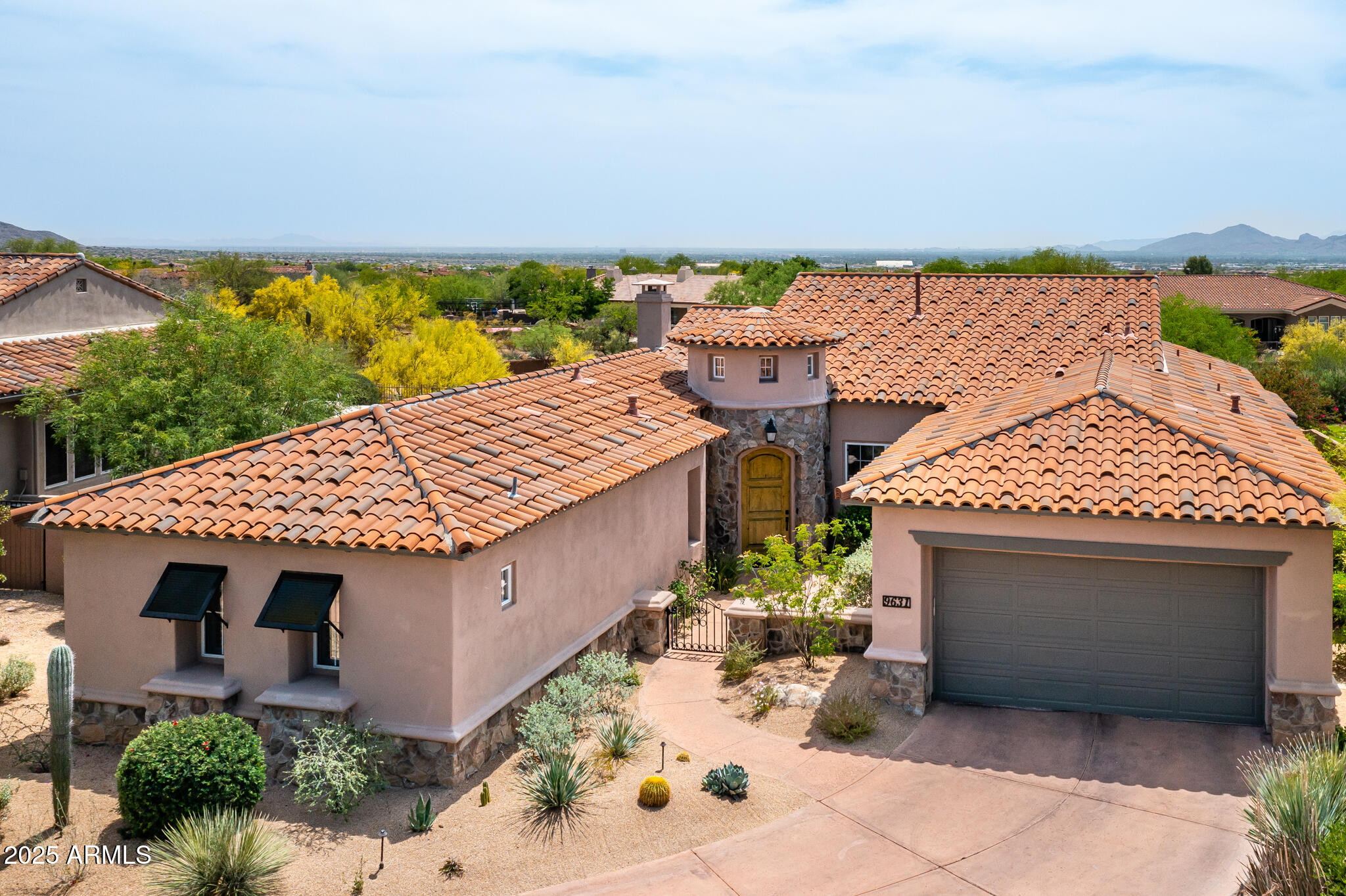9631 East Mountain Spring Road Scottsdale, AZ 85255 - Photo 48 of 48 an aerial view of a house with a patio