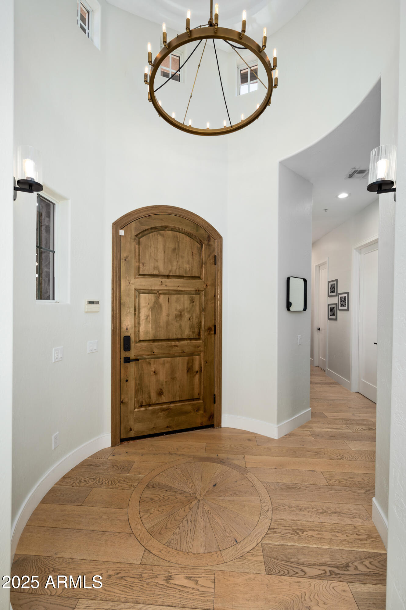 9631 East Mountain Spring Road Scottsdale, AZ 85255 - Photo 5 of 48 a view of a hallway with wooden cabinet