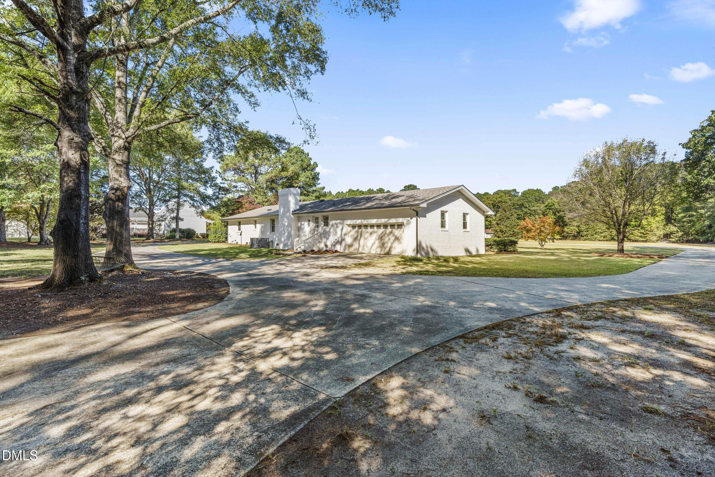 462 Sullivan Road Selma, NC 27576 - Photo 29 of 33 a view of big yard with large trees