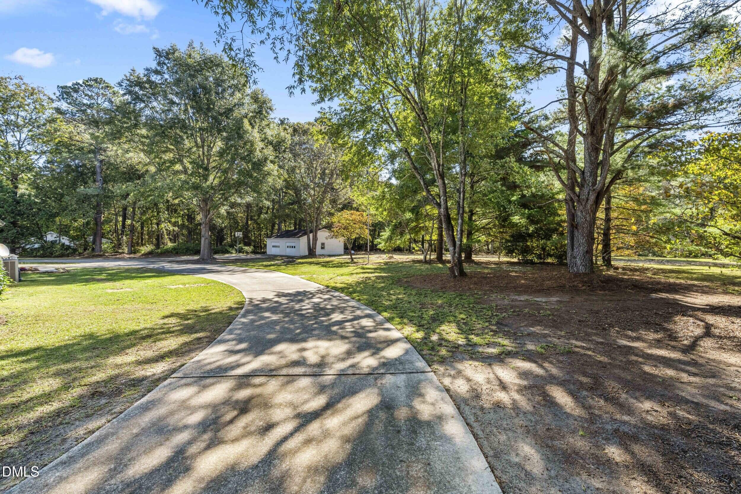 462 Sullivan Road Selma, NC 27576 - Photo 33 of 33 a view of swimming pool with an outdoor space and seating area