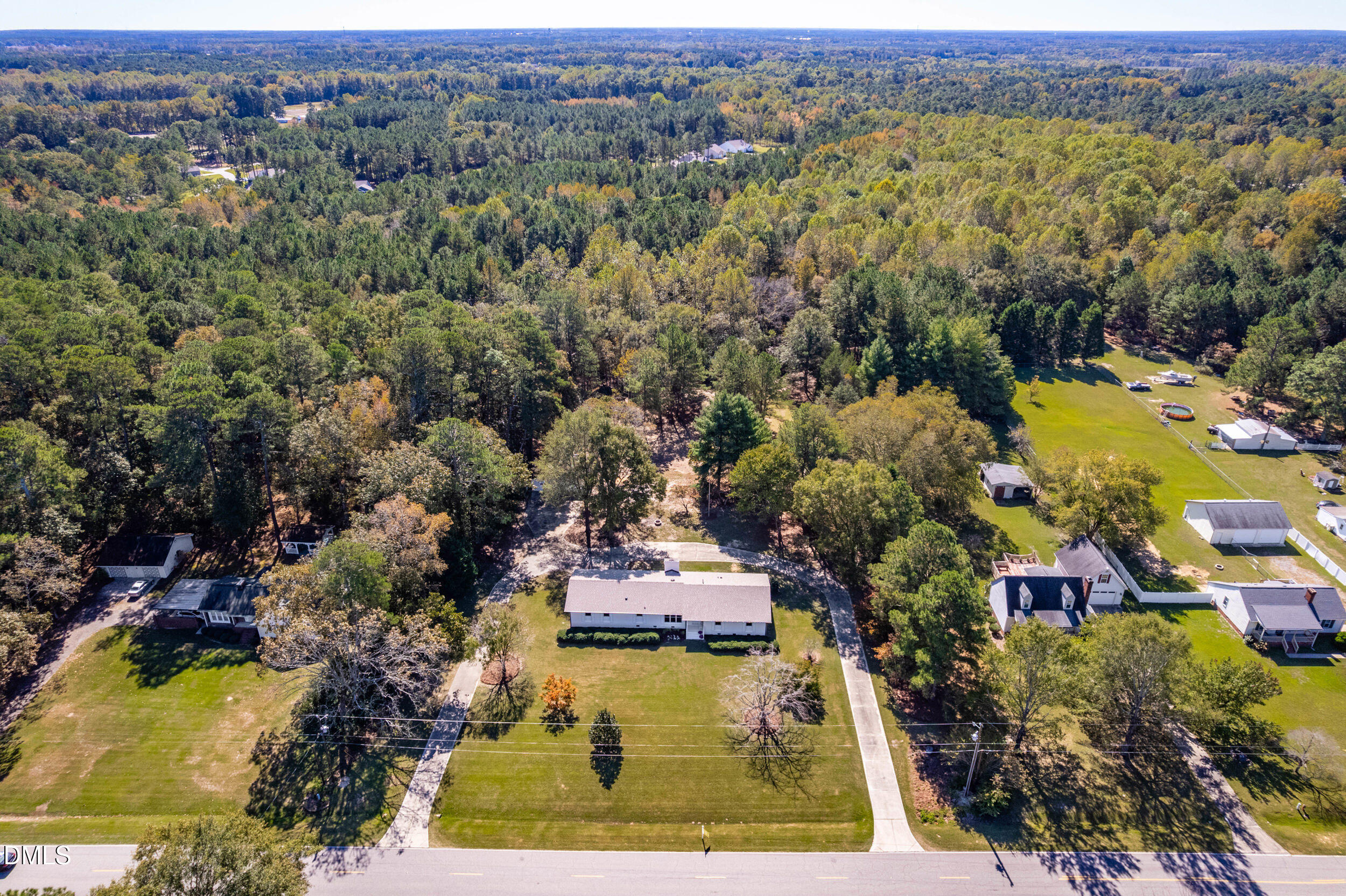 462 Sullivan Road Selma, NC 27576 - Photo 4 of 33 an aerial view of residential house with outdoor space