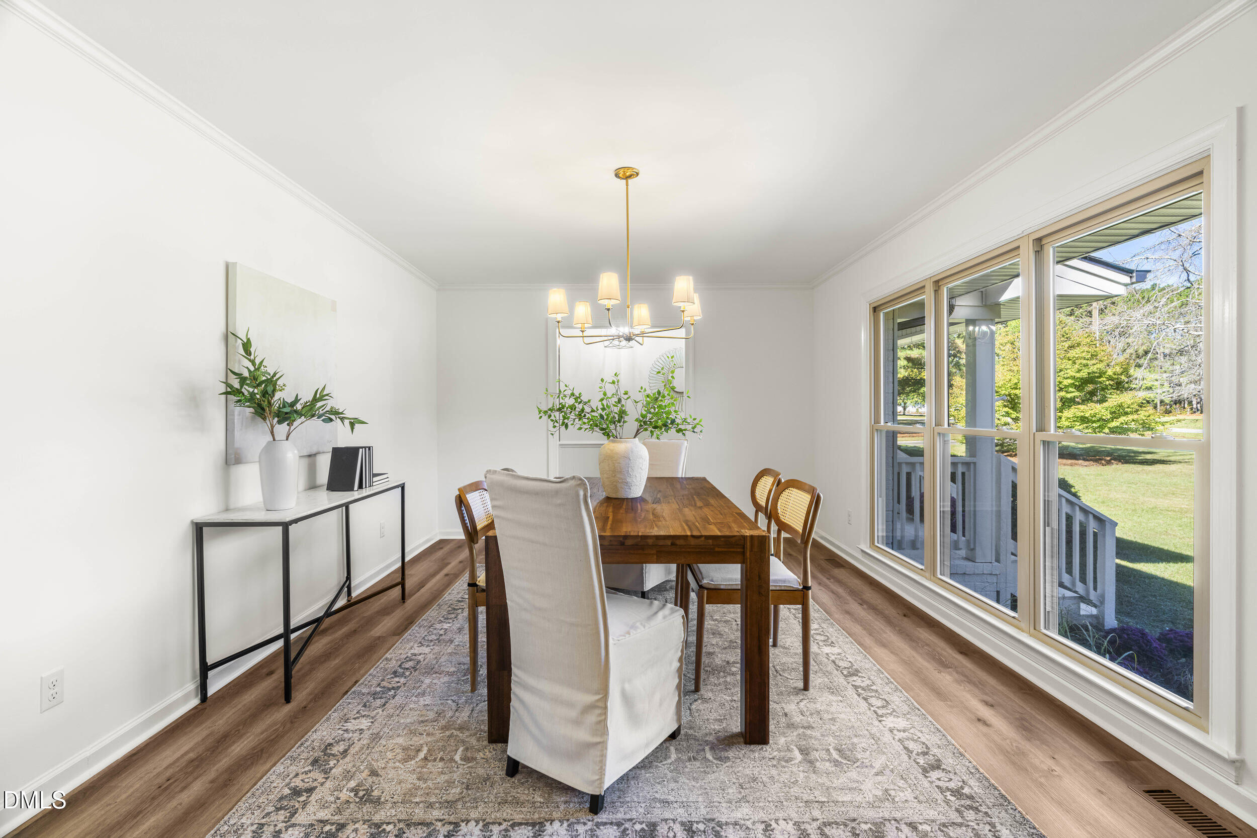 462 Sullivan Road Selma, NC 27576 - Photo 6 of 33 a view of a dining room with furniture window and wooden floor