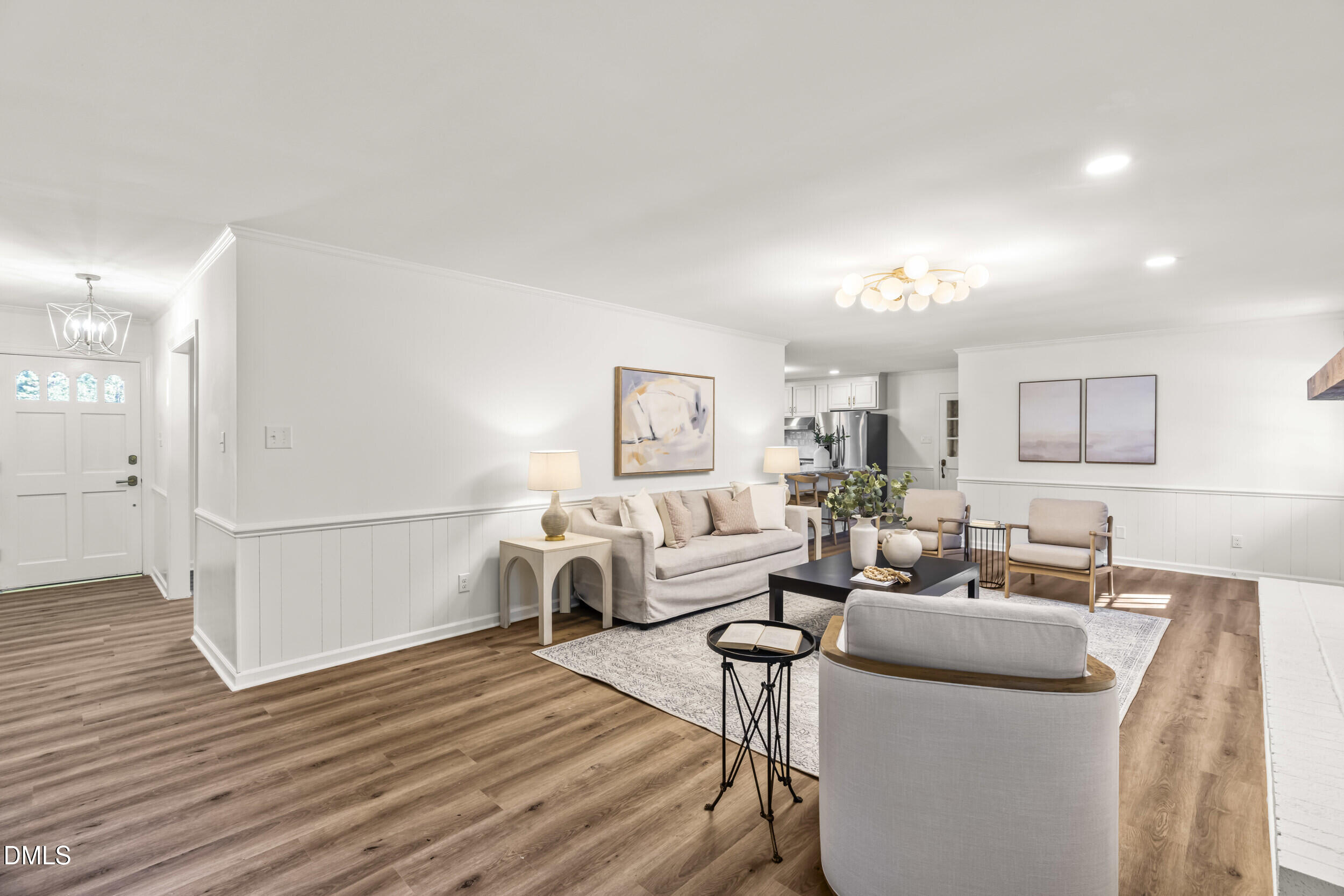 462 Sullivan Road Selma, NC 27576 - Photo 7 of 33 a living room with furniture and a wooden floor