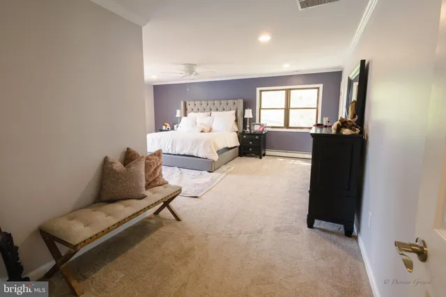 a bed room with a bed and window