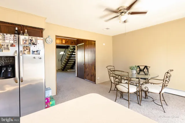 a view of a dining room with furniture