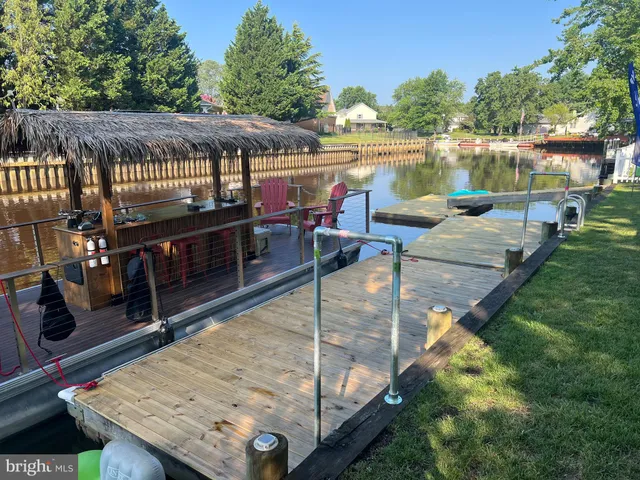 a view of a patio with wooden floor