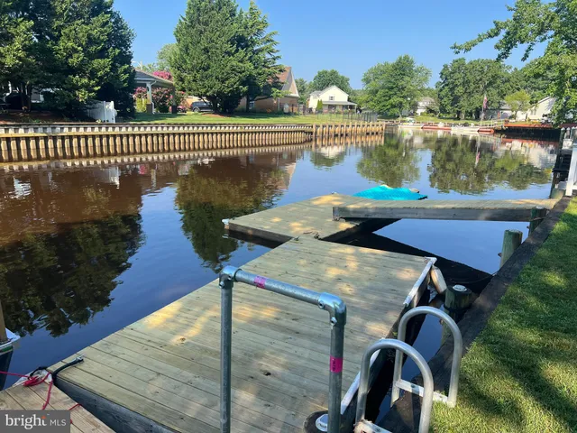 a view of a swimming pool with a lake view