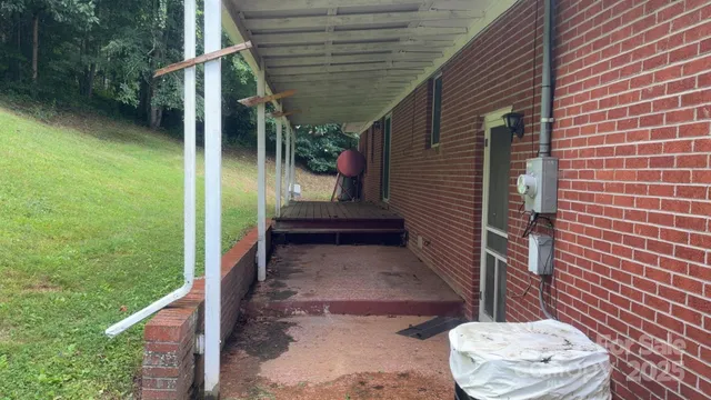 a view of a porch with a bench