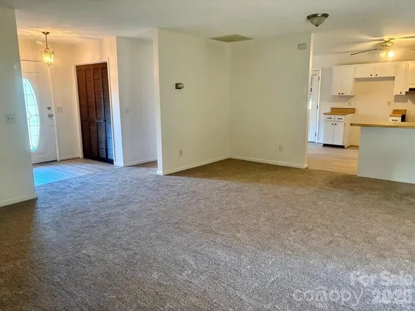 an empty room with a bathroom