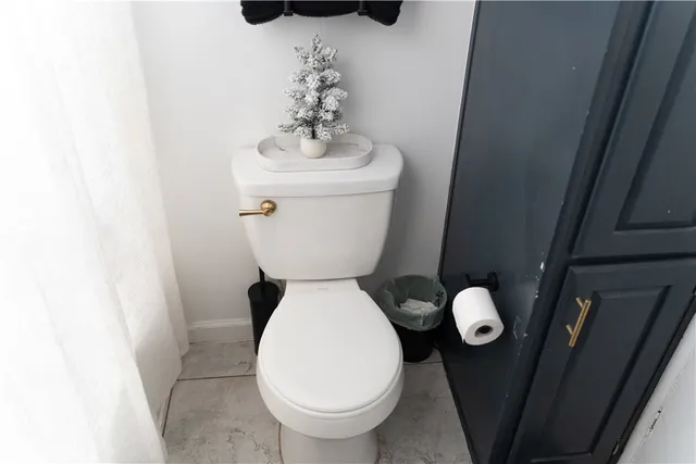 a close view of a toilet in a bathroom