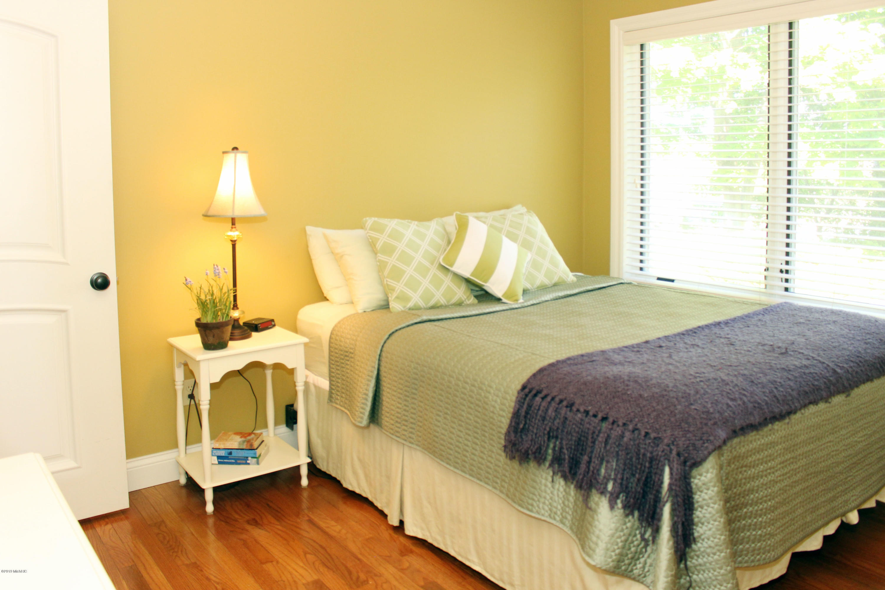 3062 Lakeshore Road Manistee, MI 49660 - Photo 32 of 63 Middle Bedroom