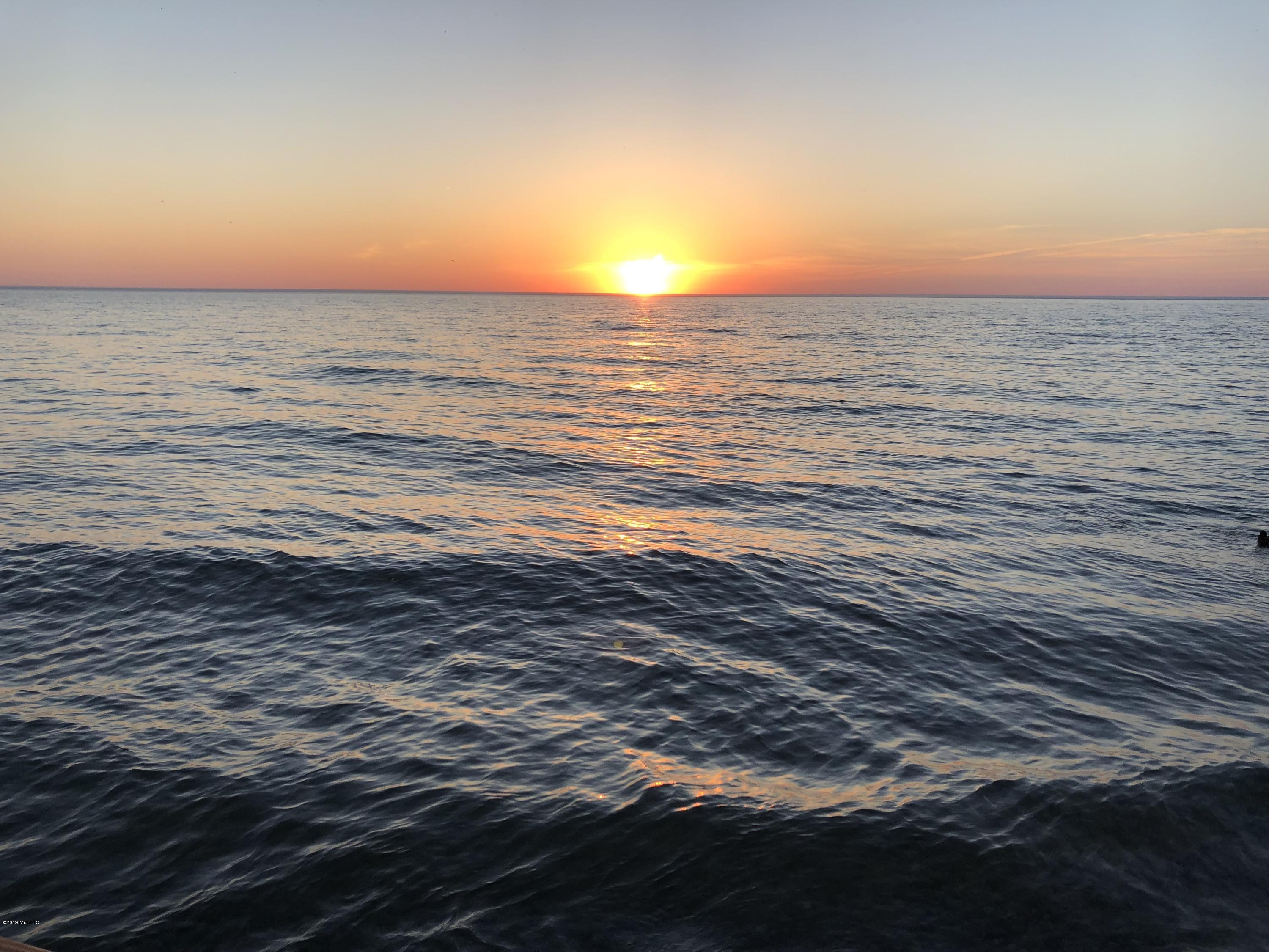 3062 Lakeshore Road Manistee, MI 49660 - Photo 48 of 63 June Sunset