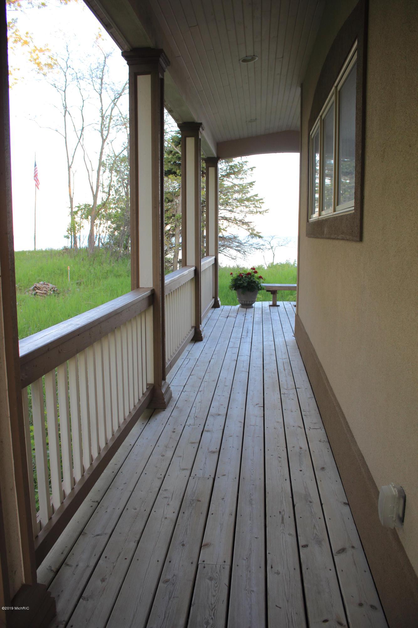 3062 Lakeshore Road Manistee, MI 49660 - Photo 59 of 63 Deck to Front Door