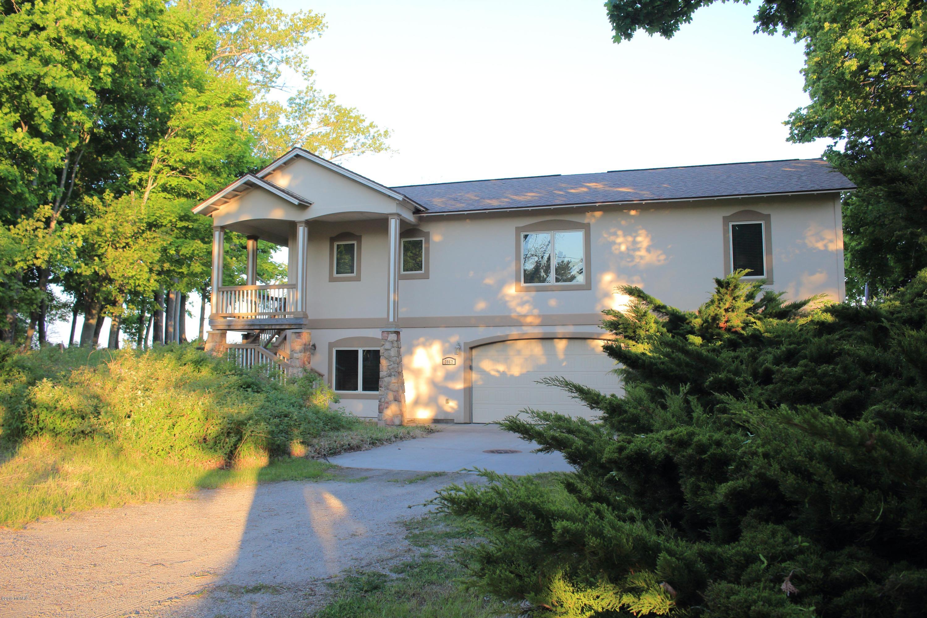 3062 Lakeshore Road Manistee, MI 49660 - Photo 61 of 63 Driveway & Home