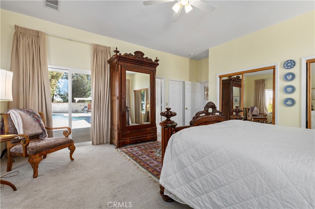 6944 Union Road Paso Robles, CA 93446 - Photo 28 of 65 a bed room with a bed and a chair