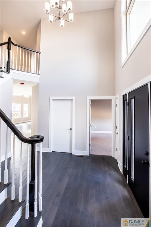 123 Millhurst Road Manalapan, NJ 07726 - Photo 2 of 27 a view of entryway with wooden floor