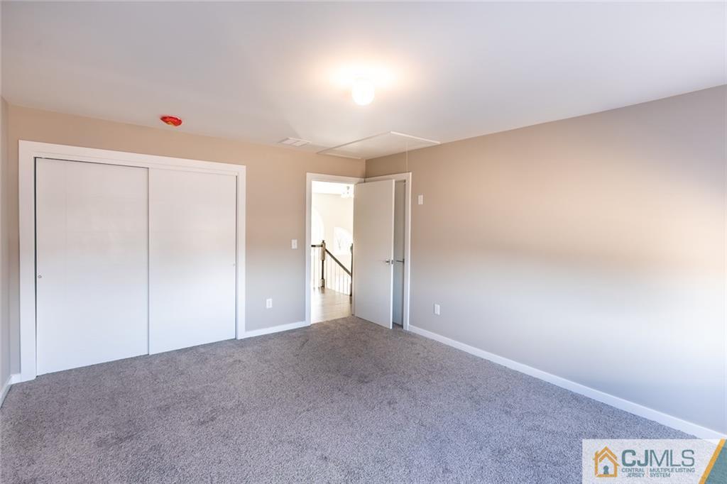 123 Millhurst Road Manalapan, NJ 07726 - Photo 18 of 27 a view of an empty room