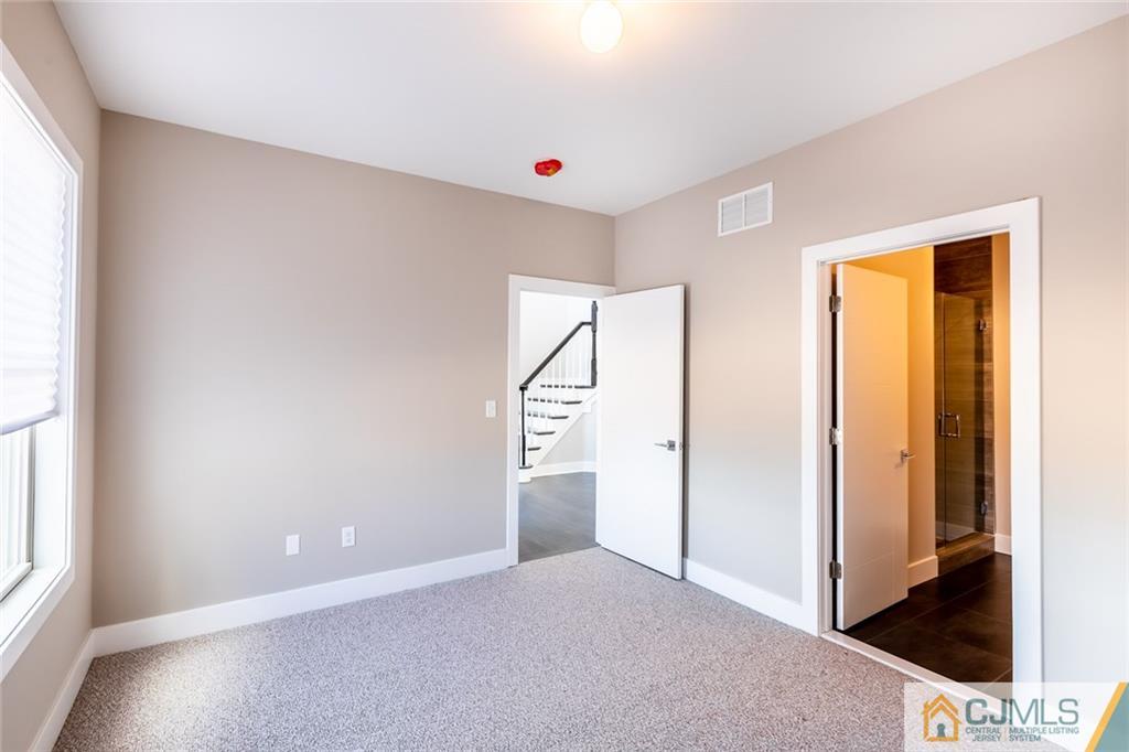 123 Millhurst Road Manalapan, NJ 07726 - Photo 22 of 27 a view of an empty room