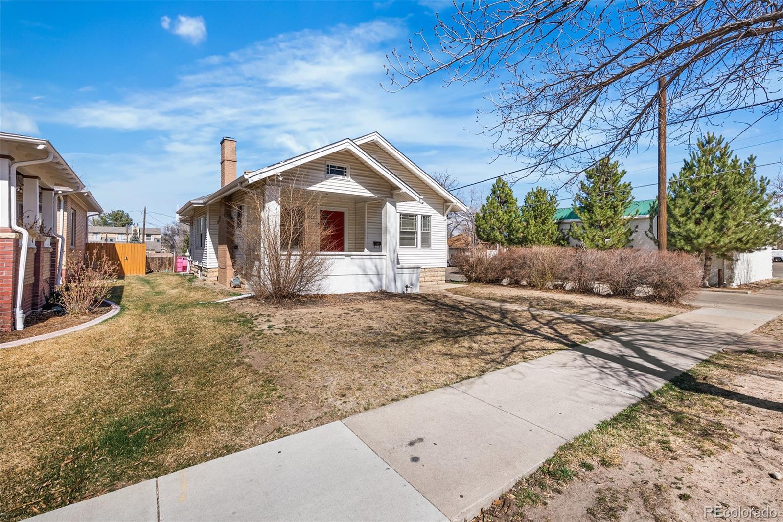 1117 16th Street Greeley, CO 80631 - Photo 2 of 37 a view of a house with a yard
