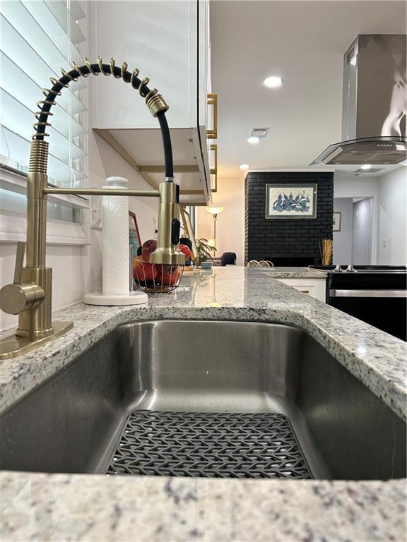 3271 Kelley Chapel Road Decatur, GA 30034 - Photo 12 of 27 a kitchen with a sink a stove and cabinets