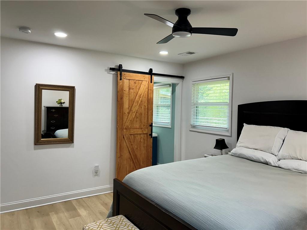 3271 Kelley Chapel Road Decatur, GA 30034 - Photo 17 of 27 a bedroom with a bed and a window
