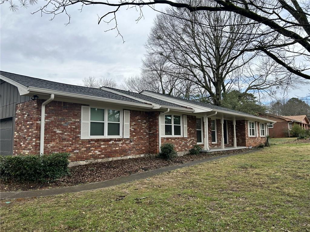 3271 Kelley Chapel Road Decatur, GA 30034 - Photo 2 of 27 a front view of a house with garden