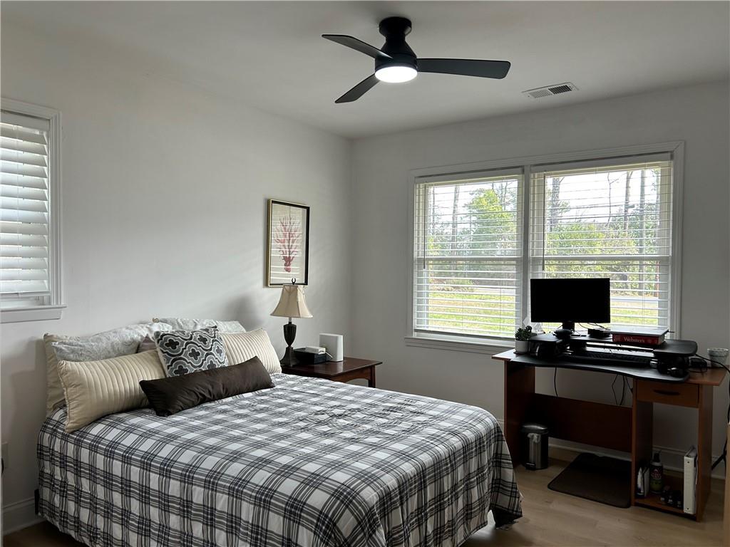 3271 Kelley Chapel Road Decatur, GA 30034 - Photo 21 of 27 a bedroom with a bed and a desk