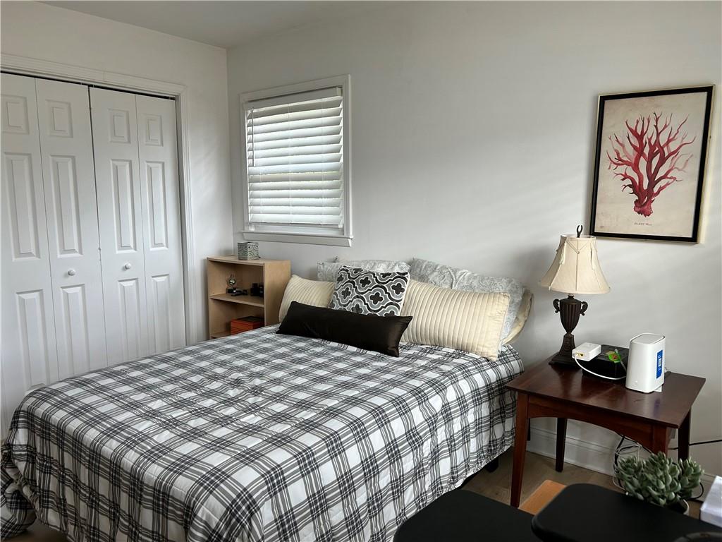 3271 Kelley Chapel Road Decatur, GA 30034 - Photo 22 of 27 a bedroom with a bed table and a window