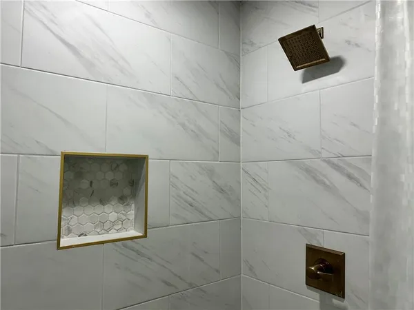a view of porch with a small yard
