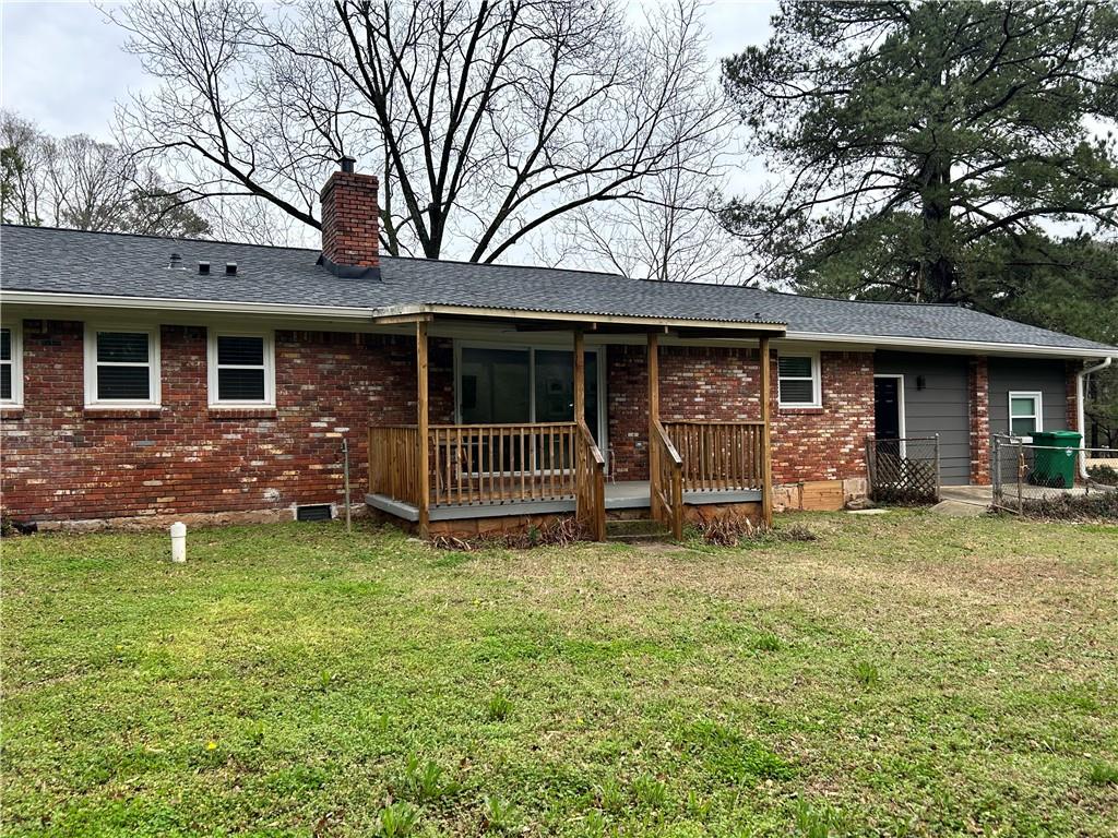 3271 Kelley Chapel Road Decatur, GA 30034 - Photo 26 of 27 a view of a house with a yard