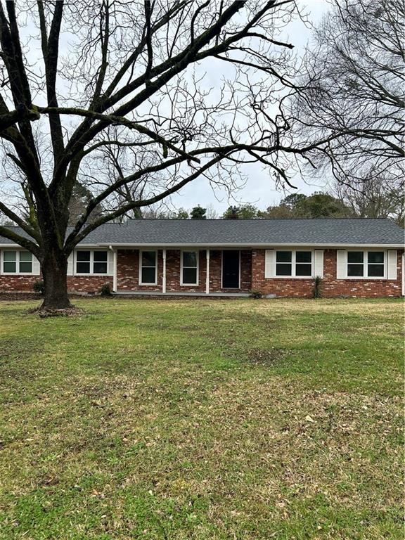 3271 Kelley Chapel Road Decatur, GA 30034 - Photo 3 of 27 a front view of house with yard and green space