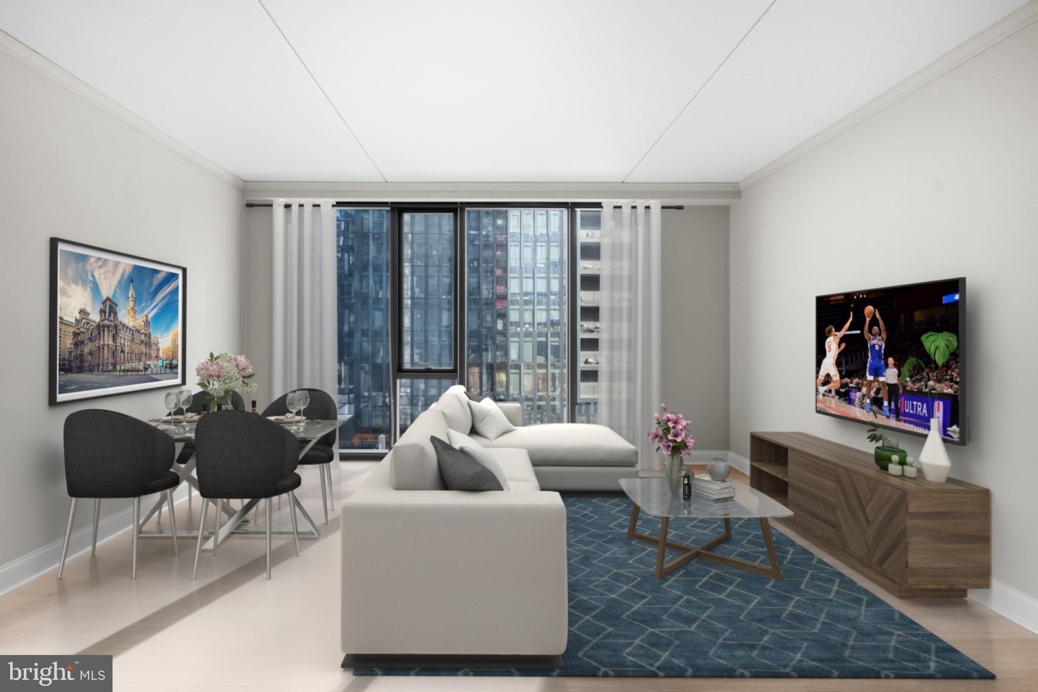 2301-61 John F Kennedy Boulevard, Unit 1815 Philadelphia, PA 19103 - Photo 2 of 39 a living room with furniture and a flat screen tv