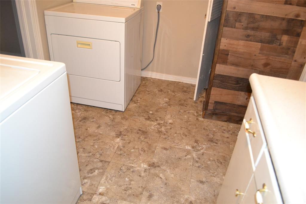 919 Denton Street Denton, TX 76201 - Photo 11 of 23 Detail of the laundry room showing plenty of space for chores.