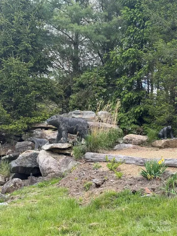 a view of a lake with a house in the background