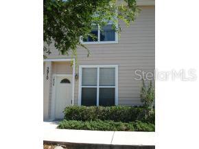 3910 Southwest 20th Avenue Gainesville, FL 32607 - Photo 1 of 1 a view of a house with a window and garden