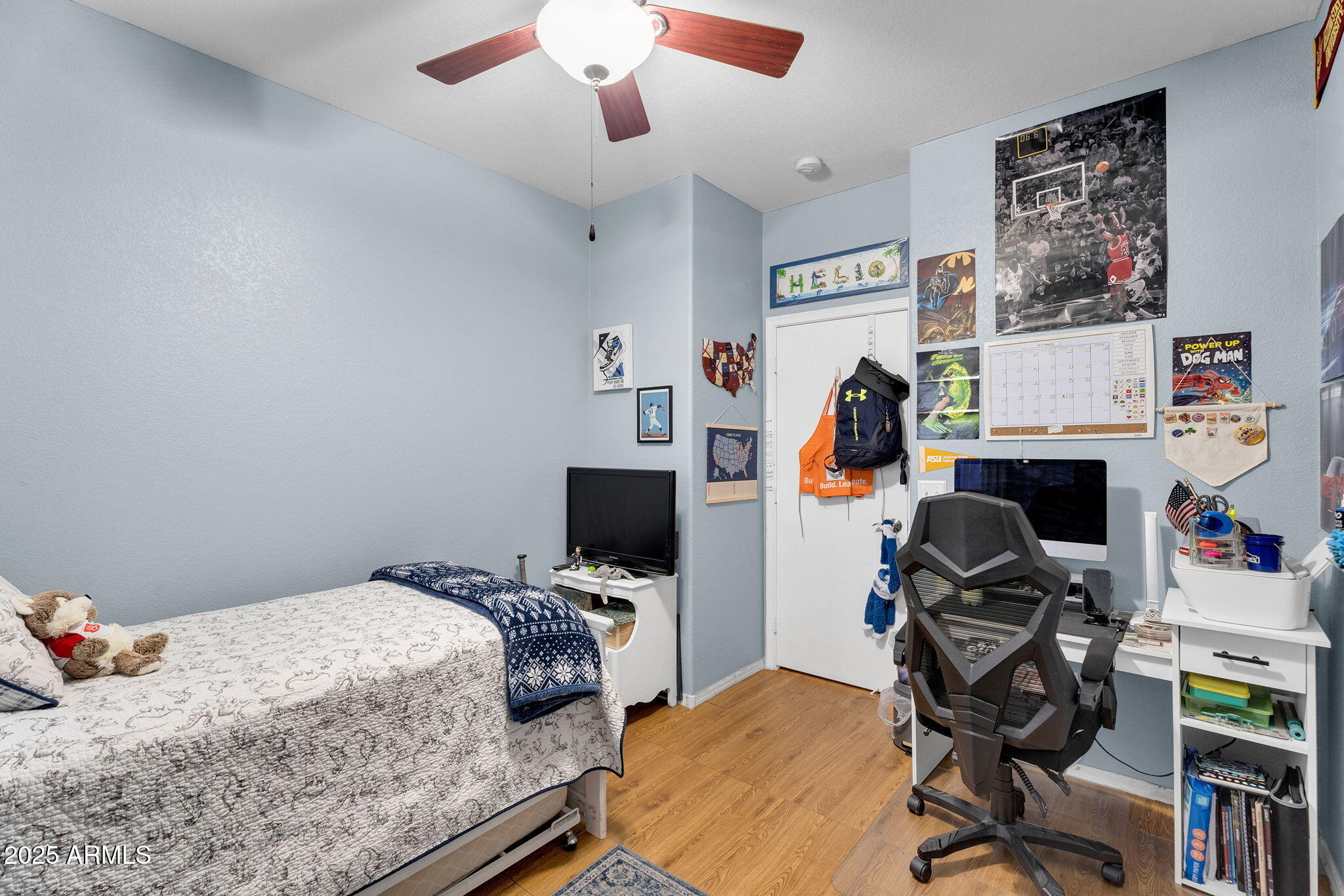 13122 West Calavar Road Surprise, AZ 85379 - Photo 24 of 34 a bedroom with a workspace