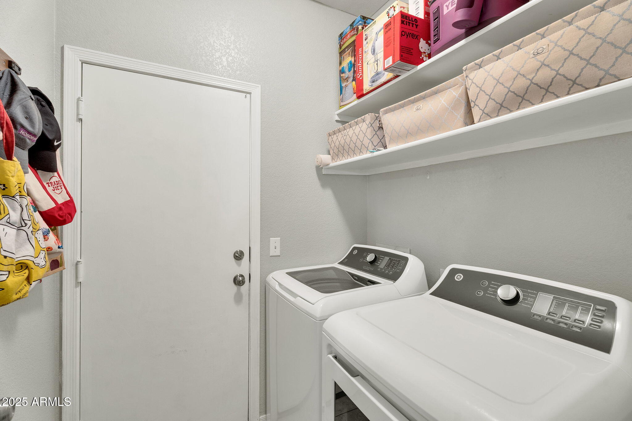 13122 West Calavar Road Surprise, AZ 85379 - Photo 26 of 34 a utility room with dryer and washer